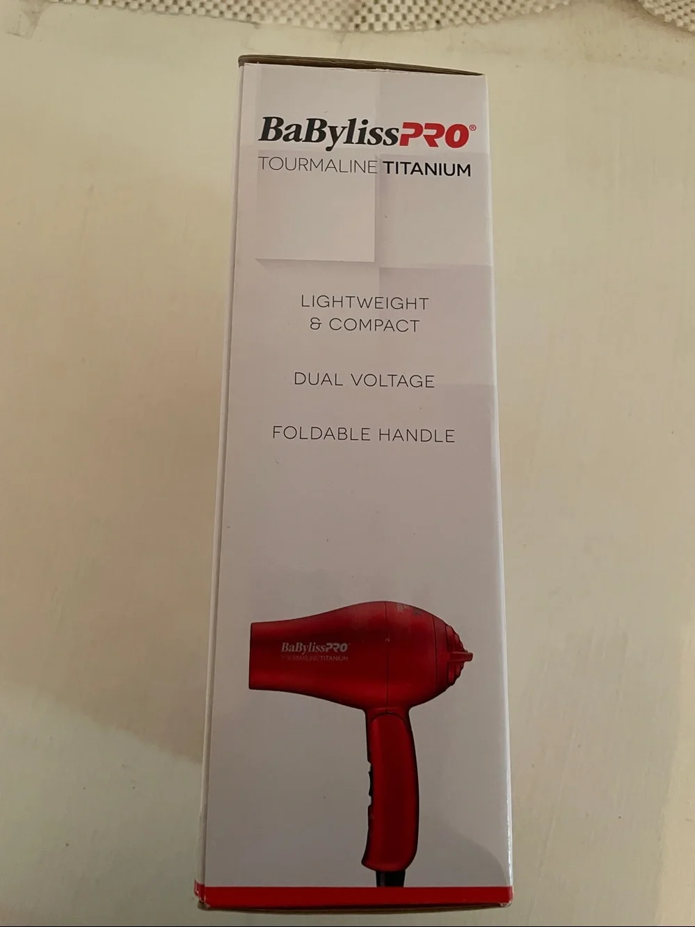 Brand new Babyliss Tourmaline Titanium Travel Hairdryer